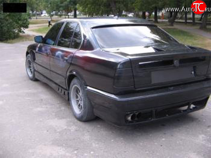 4 999 р. Накладка на задний бампер Rieger BMW 5 серия E34 седан дорестайлинг (1988-1994)  с доставкой в г. Екатеринбург