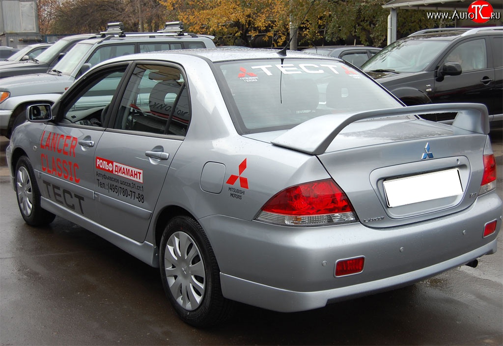 4 249 р. Накладка заднего бампера GT Dynamics Mitsubishi Lancer 9 2-ой рестайлинг седан (2005-2009) (Неокрашенная)  с доставкой в г. Екатеринбург