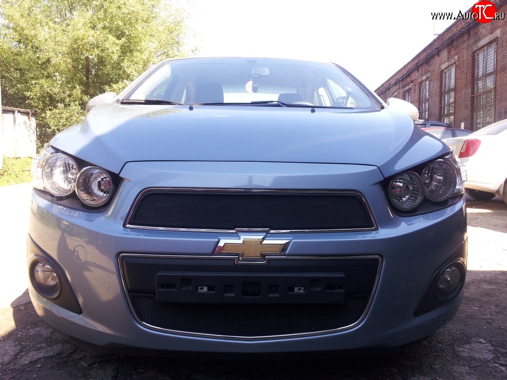 1 469 р. Нижняя сетка на бампер Russtal (черная)  Chevrolet Aveo  T300 (2011-2015) седан, хэтчбек  с доставкой в г. Екатеринбург