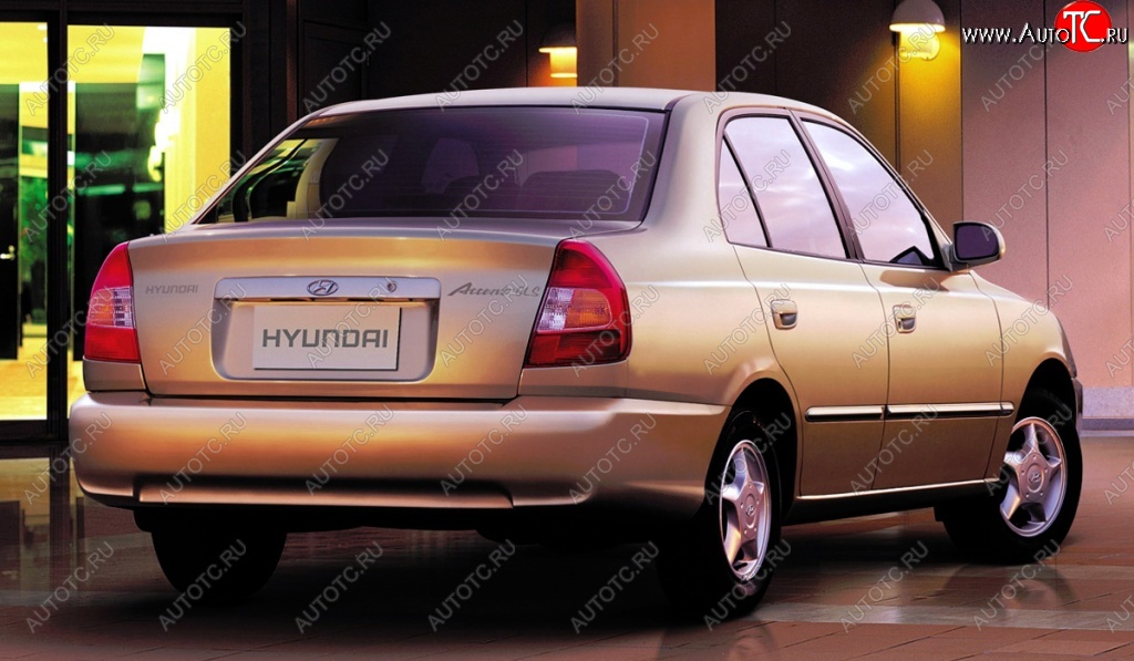 4 899 р. Задний бампер Стандартный Hyundai Accent седан ТагАЗ (2001-2012) (Неокрашенный)  с доставкой в г. Екатеринбург