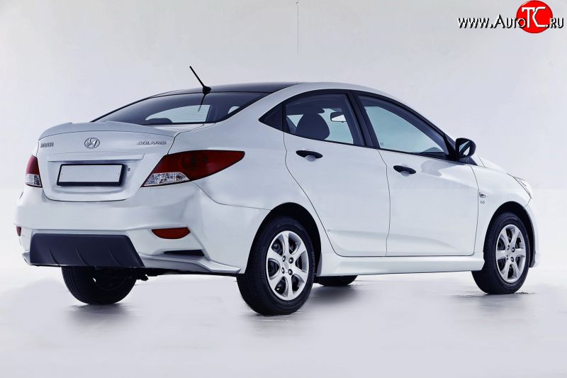 14 499 р. Задний бампер Sport  Hyundai Solaris  RBr (2010-2014) седан дорестайлинг (Неокрашенный)  с доставкой в г. Екатеринбург