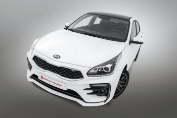 29 699 р. Передний бампер Kudos LUX  KIA Rio  4 FB (2016-2020) дорестайлинг седан (Под прямоугольные ДХО с ПТФ, Неокрашенный)  с доставкой в г. Екатеринбург. Увеличить фотографию 1