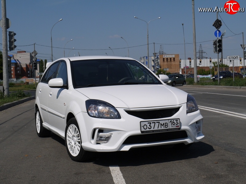 10 999 р. Передний бампер Vita Dm  KIA Rio ( 2 JB,  4 FB) (2005-2024) дорестайлинг седан, дорестайлинг, хэтчбэк 5 дв., рестайлинг, хэтчбэк 5 дв., рестайлинг седан (Без сетки, Неокрашенный)  с доставкой в г. Екатеринбург