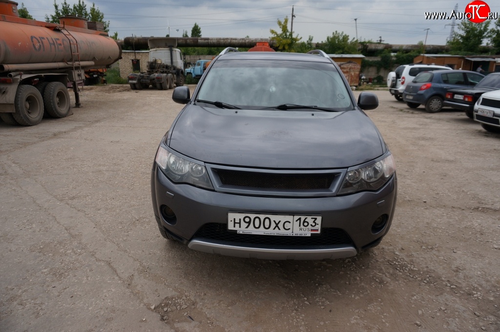 5 449 р. Решётка радиатора (рестайлинг) Sport Mitsubishi Outlander XL (CW)  рестайлинг (2010-2013) (Неокрашенная)  с доставкой в г. Екатеринбург