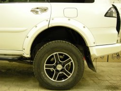 15 349 р. Накладки на колёсные арки BUSHWACKER Mitsubishi Pajero Sport PB дорестайлинг (2008-2013) (Неокрашенные)  с доставкой в г. Екатеринбург. Увеличить фотографию 3